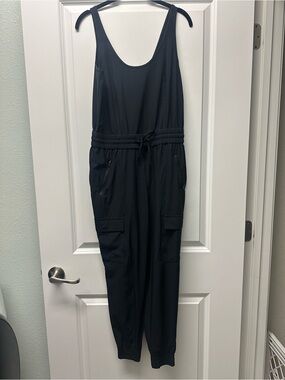Like New Athleta Black Utility Jumpsuit with Cargo Pockets Crew Neck XS Petite